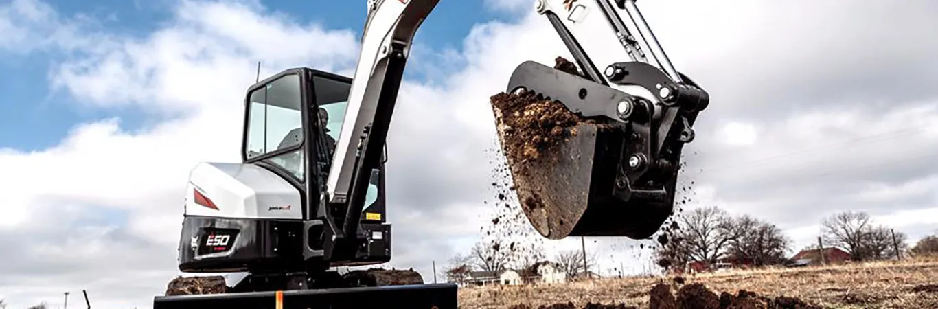 E50 Excavator Moving Dirt